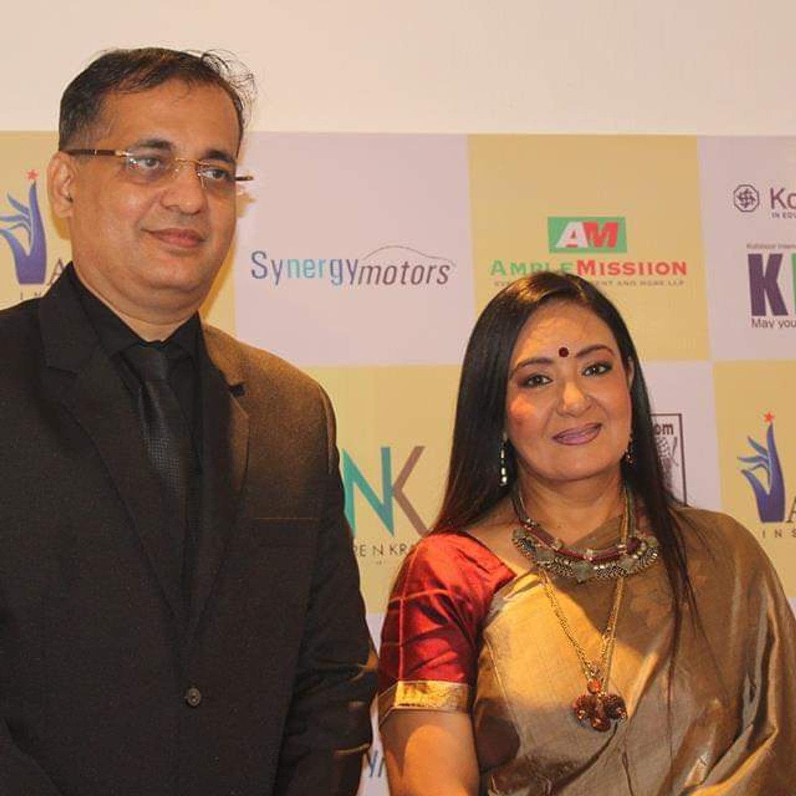 The founders of Sanskriti Arts receiving an award